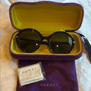 Gucci black round sunglasses with purple case